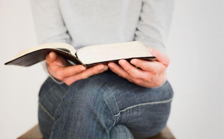 woman reading a Bible